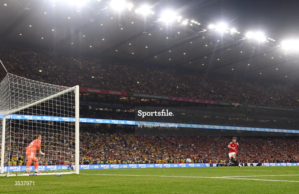 12 August 2026; Jack Fletcher of Manchester United scores his penalty past Leeds United goalkeeper Alex Cairns during a penalty shootout at the end of the pre-season friendly match between Manchester United and Leeds United at Croke Park in Dublin. Photo by Stephen McCarthy/Sportsfile