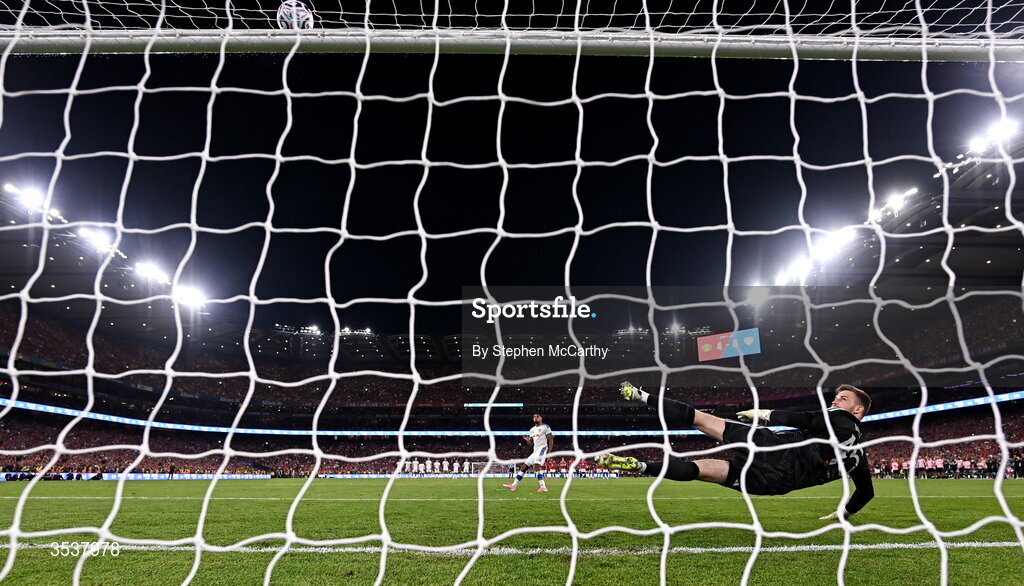 12 August 2026; Manchester United goalkeeper Dermot Mee watches the ball as James Justin of Leeds United fails to convert during a penalty shootout at the end of the pre-season friendly match between Manchester United and Leeds United at Croke Park in Dublin. Photo by Stephen McCarthy/Sportsfile