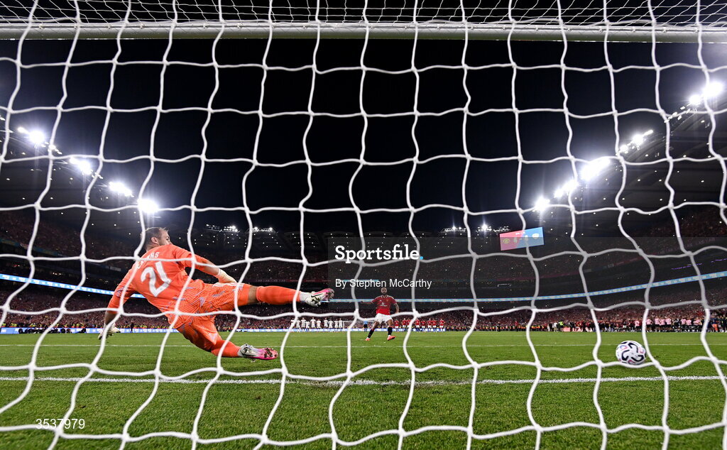 12 August 2026; Noussair Mazraoui of Manchester United scores past Leeds United goalkeeper Alex Cairns during a penalty shootout at the end of the pre-season friendly match between Manchester United and Leeds United at Croke Park in Dublin. Photo by Stephen McCarthy/Sportsfile