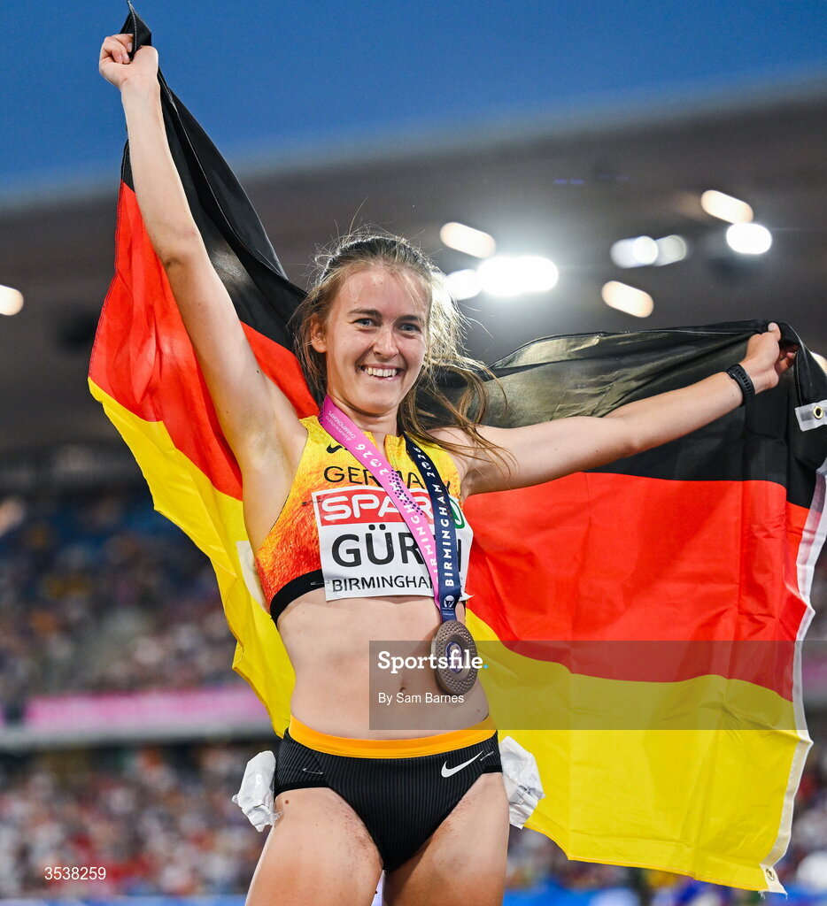 13 August 2026; Olivia Gürth of Germany celebrates finishing third with her bronze medal after the women's 3000m steeplechase final during day four of the European Athletics Championships 2026 at Alexander Stadium in Birmingham, England. Photo by Sam Barnes/Sportsfile