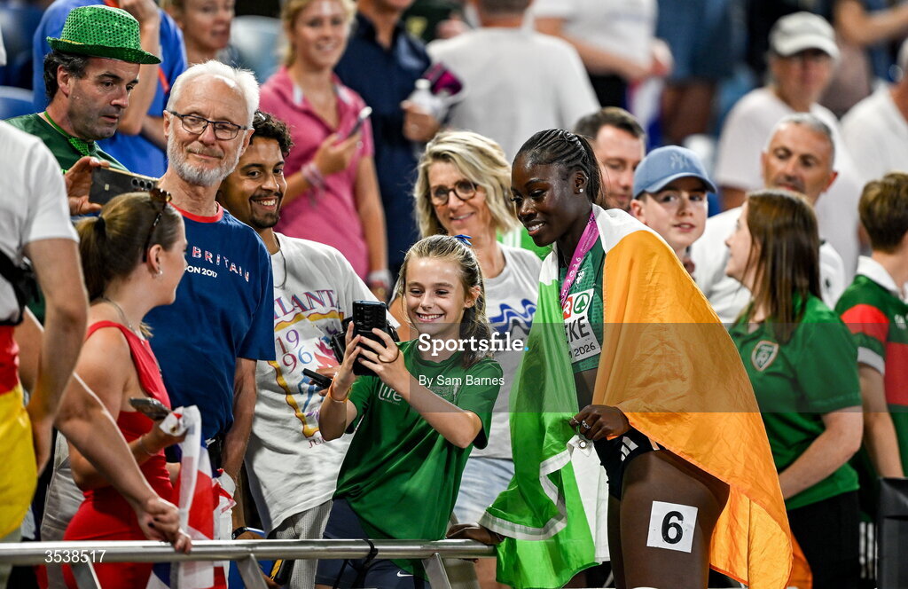 13 August 2026; Rhasidat Adeleke of Ireland celebrates with supporters after finishing second and winning the silver medal in the women's 200m final during day four of the European Athletics Championships 2026 at Alexander Stadium in Birmingham, England. Photo by Sam Barnes/Sportsfile