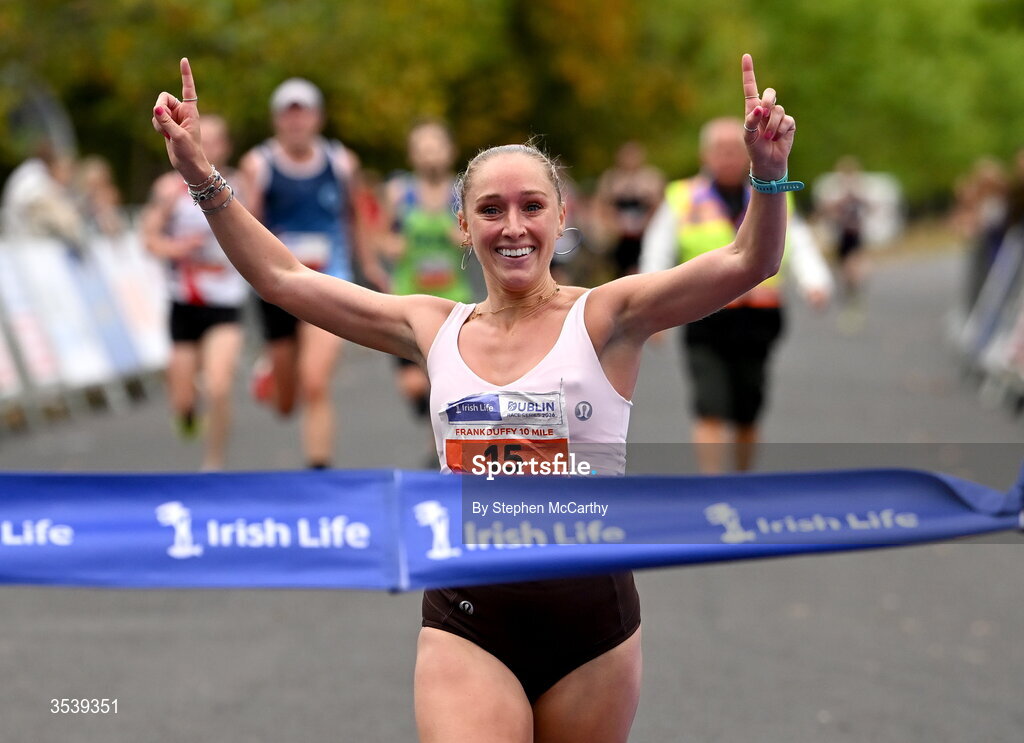 15 August 2026; Maebh Brannigan of Galway City Harriers AC approaches the finish line to win the 2026 Irish Life Frank Duffy 10 Mile, in the Phoenix Park, Dublin. Thousands of runners took part in the sold out Irish Life Frank Duffy 10 Mile, the second event in the 2026 Irish Life Dublin Race Series. Photo by Stephen McCarthy/Sportsfile