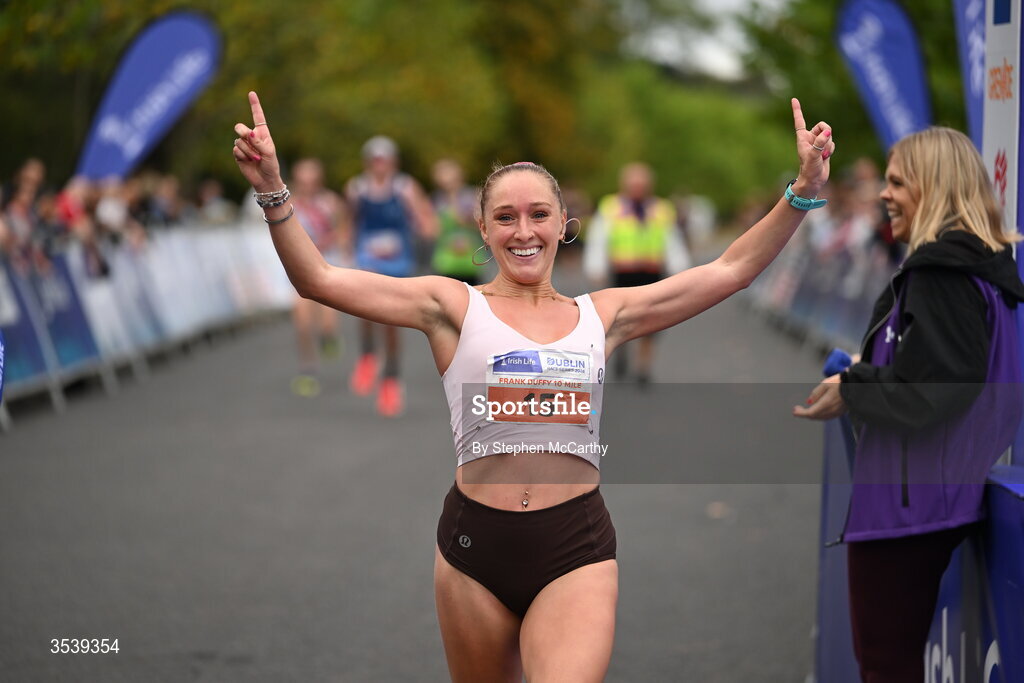 15 August 2026; Maebh Brannigan of Galway City Harriers AC crosses the finish line to win the 2026 Irish Life Frank Duffy 10 Mile, in the Phoenix Park, Dublin. Thousands of runners took part in the sold out Irish Life Frank Duffy 10 Mile, the second event in the 2026 Irish Life Dublin Race Series. Photo by Stephen McCarthy/Sportsfile