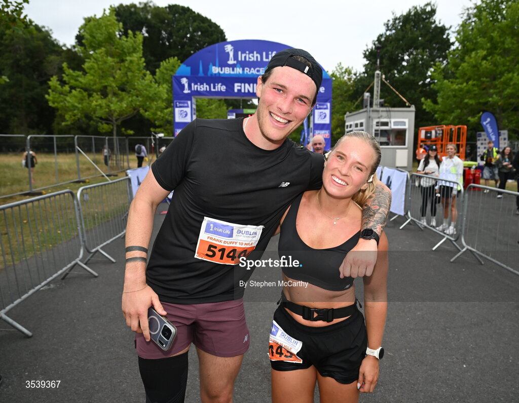 15 August 2026; Ciaran O'Connor and partner Aoibhinn Raleigh after finishing the 2026 Irish Life Frank Duffy 10 Mile, in the Phoenix Park, Dublin. Thousands of runners took part in the sold out Irish Life Frank Duffy 10 Mile, the second event in the 2026 Irish Life Dublin Race Series. Photo by Stephen McCarthy/Sportsfile