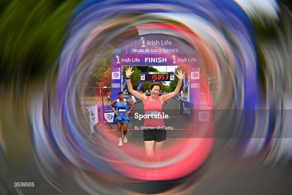 15 August 2026; (EDITORS NOTE: A special effects camera filter was used for this image.) Martina Gardiner of Portlaoise AC celebrates after the 2026 Irish Life Frank Duffy 10 Mile, in the Phoenix Park, Dublin. Thousands of runners took part in the sold out Irish Life Frank Duffy 10 Mile, the second event in the 2026 Irish Life Dublin Race Series. Photo by Stephen McCarthy/Sportsfile