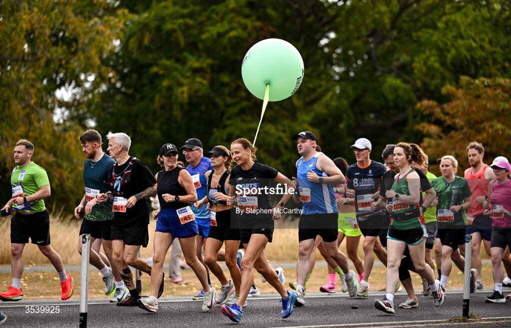 15 August 2026; Athletes, including Sharon Woods and a pacer during the 2026 Irish Life Frank Duffy 10 Mile, in the Phoenix Park, Dublin. Thousands of runners took part in the sold out Irish Life Frank Duffy 10 Mile, the second event in the 2026 Irish Life Dublin Race Series. Photo by Stephen McCarthy/Sportsfile