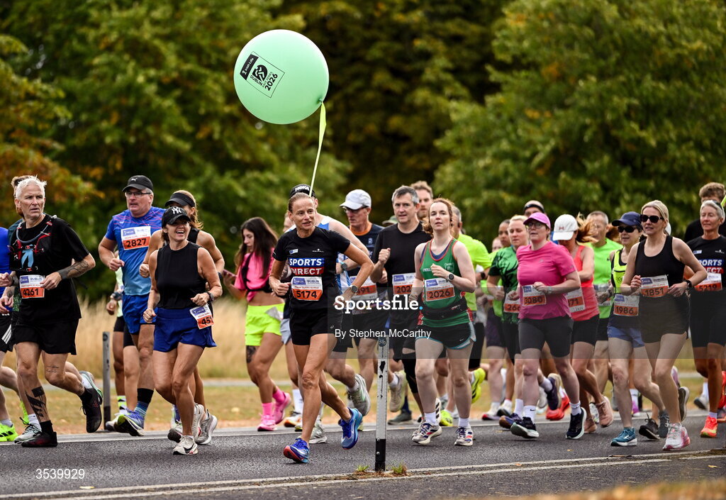 15 August 2026; Athletes, including Sharon Woods and a pacer during the 2026 Irish Life Frank Duffy 10 Mile, in the Phoenix Park, Dublin. Thousands of runners took part in the sold out Irish Life Frank Duffy 10 Mile, the second event in the 2026 Irish Life Dublin Race Series. Photo by Stephen McCarthy/Sportsfile
