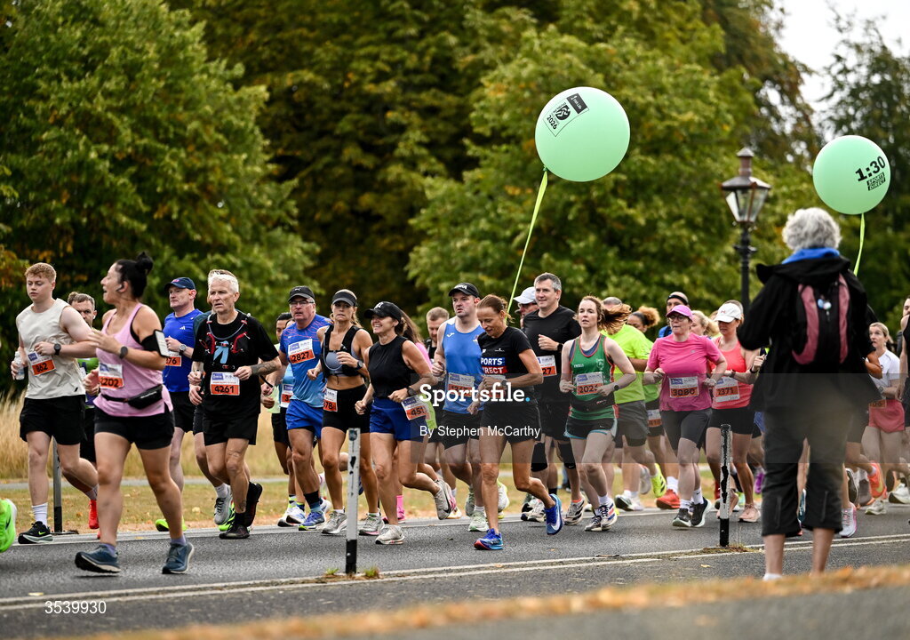 15 August 2026; Athletes, including Sharon Woods and a pacer during the 2026 Irish Life Frank Duffy 10 Mile, in the Phoenix Park, Dublin. Thousands of runners took part in the sold out Irish Life Frank Duffy 10 Mile, the second event in the 2026 Irish Life Dublin Race Series. Photo by Stephen McCarthy/Sportsfile