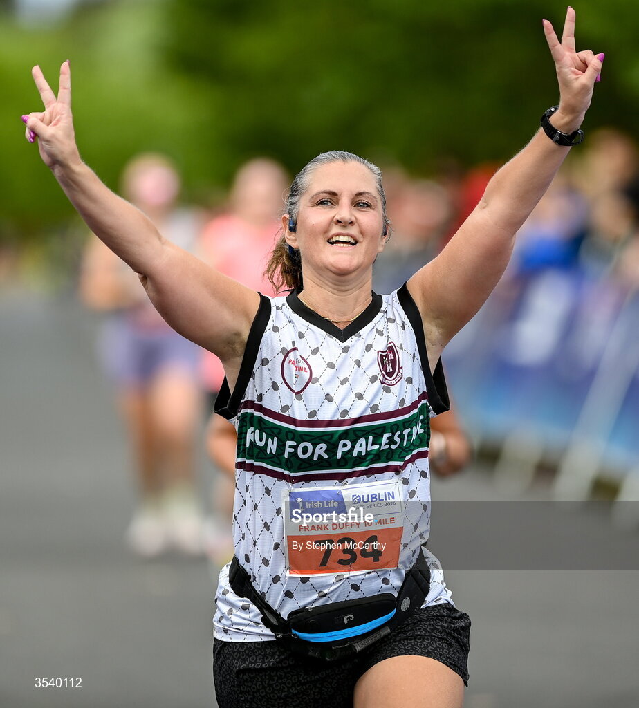 15 August 2026; Meadhbh McCann from Dublin celebrates after finishing the 2026 Irish Life Frank Duffy 10 Mile, in the Phoenix Park, Dublin. Thousands of runners took part in the sold out Irish Life Frank Duffy 10 Mile, the second event in the 2026 Irish Life Dublin Race Series. Photo by Stephen McCarthy/Sportsfile