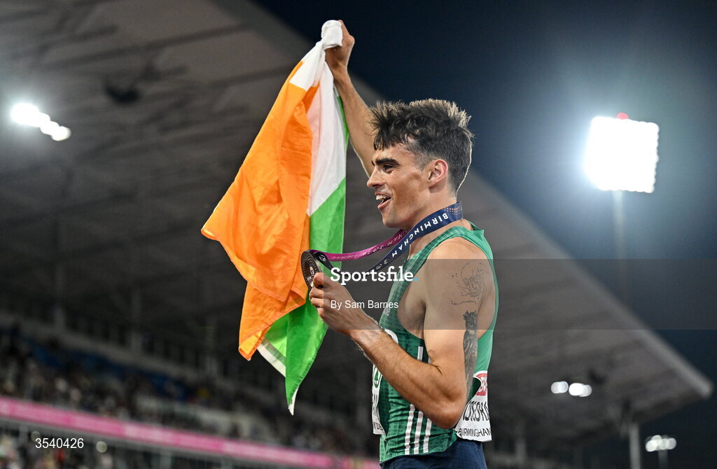 15 August 2026; Andrew Coscoran of Ireland celebrates with his bronze medal after the men’s 1500m final during day six of the European Athletics Championships 2026 at Alexander Stadium in Birmingham, England. Photo by Sam Barnes/Sportsfile