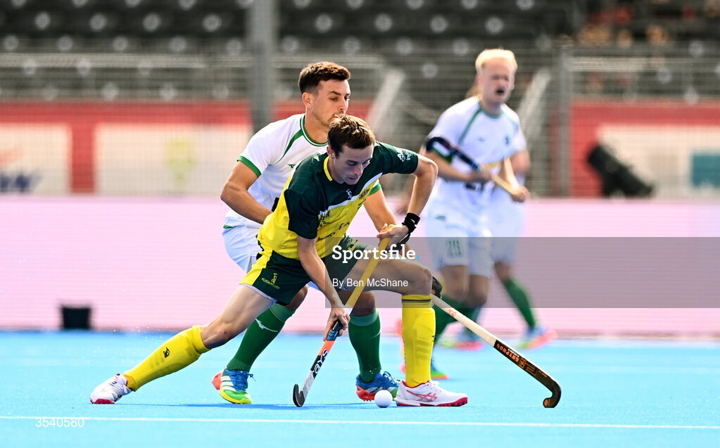 16 August 2026; Ky Willott of Australia in action against Matthew Nelson of Ireland during the FIH Men's Hockey World Cup 2026 Pool C match between Ireland and Australia at the Belfius Hockey Arena in Wavre, Belgium. Photo by Ben McShane/Sportsfile