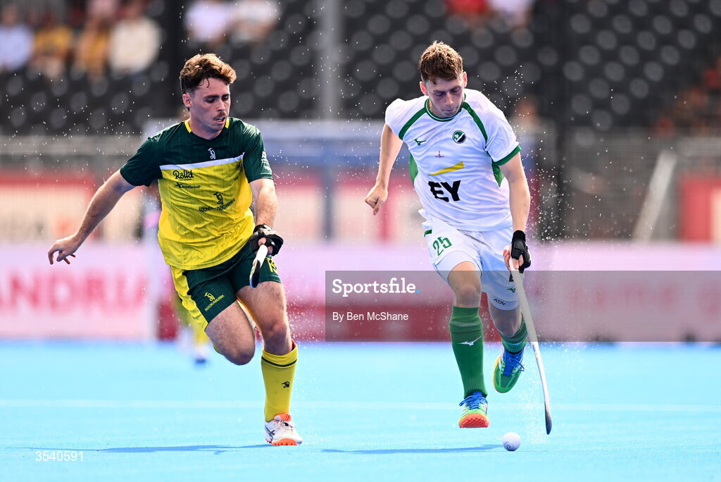 16 August 2026; Jonathan Lynch of Ireland in action against Jayden Atkinson of Australia during the FIH Men's Hockey World Cup 2026 Pool C match between Ireland and Australia at the Belfius Hockey Arena in Wavre, Belgium. Photo by Ben McShane/Sportsfile