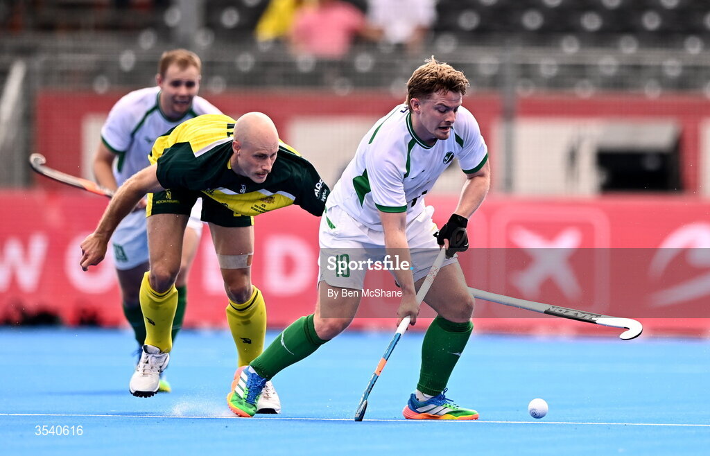 16 August 2026; Peter McKibbin of Ireland in action against Jack Welch of Australia during the FIH Men's Hockey World Cup 2026 Pool C match between Ireland and Australia at the Belfius Hockey Arena in Wavre, Belgium. Photo by Ben McShane/Sportsfile