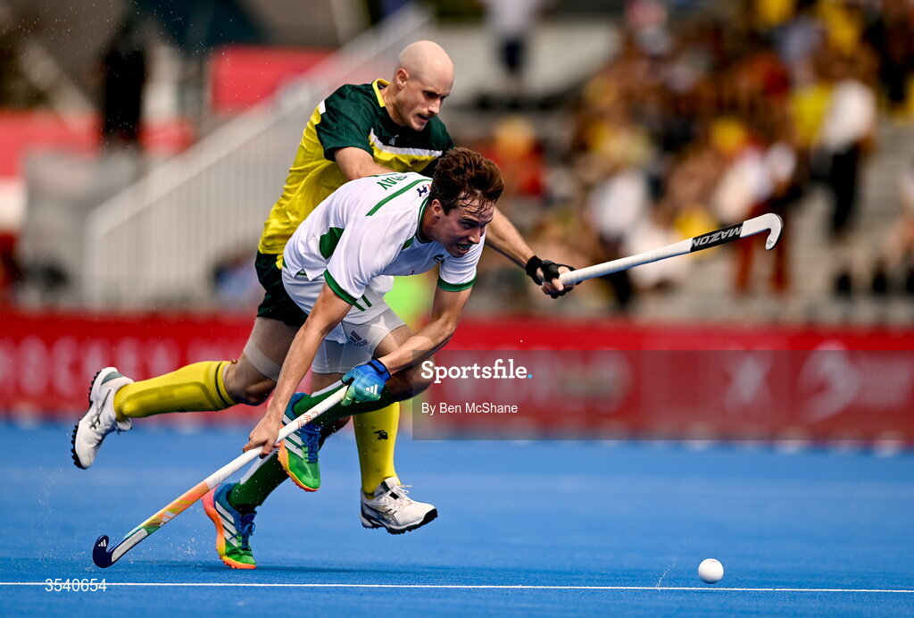 16 August 2026; Sean Murray of Ireland in action against Jack Welch of Australia during the FIH Men's Hockey World Cup 2026 Pool C match between Ireland and Australia at the Belfius Hockey Arena in Wavre, Belgium. Photo by Ben McShane/Sportsfile