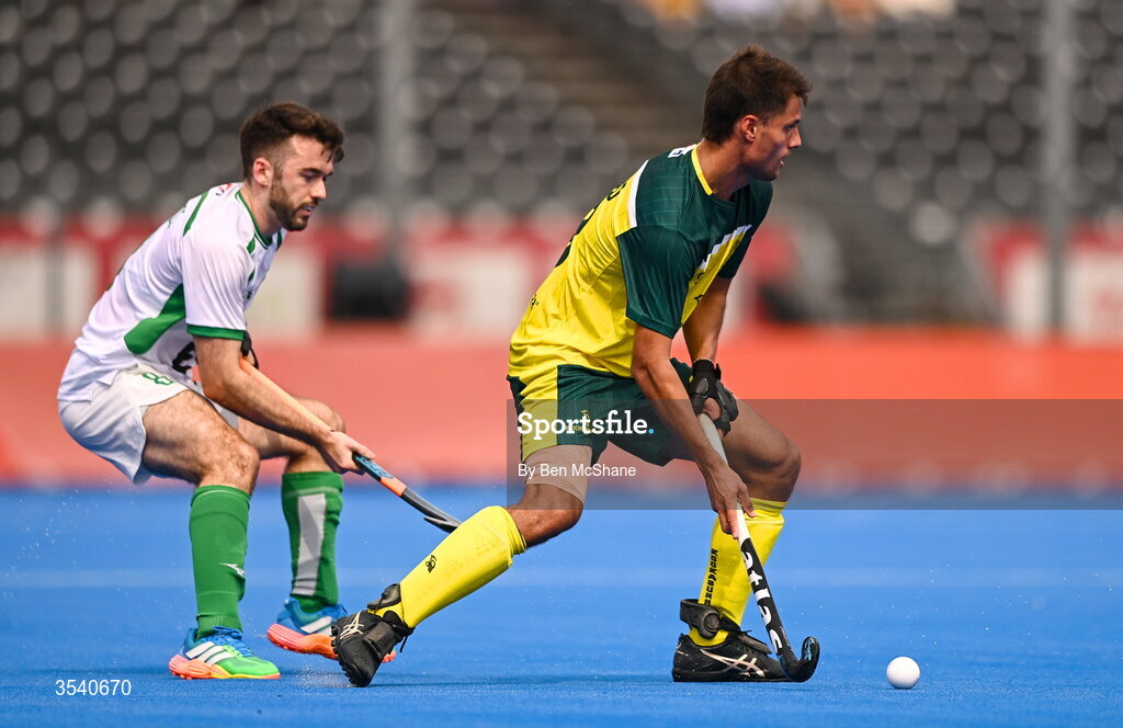 16 August 2026; Tim Brand of Australia in action against John McKee of Ireland during the FIH Men's Hockey World Cup 2026 Pool C match between Ireland and Australia at the Belfius Hockey Arena in Wavre, Belgium. Photo by Ben McShane/Sportsfile