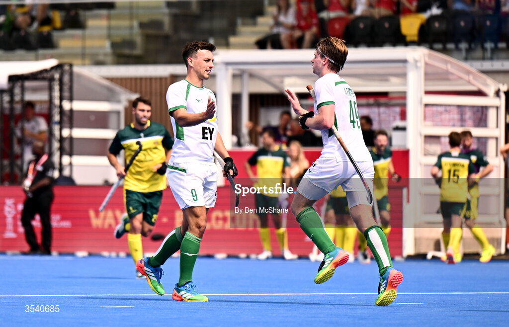 16 August 2026; Alistair Empey of Ireland, right, celebrates with teammate Matthew Nelson after scoring their side's first goal during the FIH Men's Hockey World Cup 2026 Pool C match between Ireland and Australia at the Belfius Hockey Arena in Wavre, Belgium. Photo by Ben McShane/Sportsfile