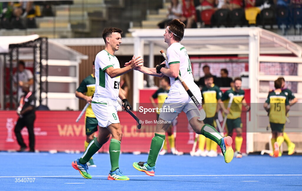16 August 2026; Alistair Empey of Ireland, right, celebrates with teammate Matthew Nelson after scoring their side's first goal during the FIH Men's Hockey World Cup 2026 Pool C match between Ireland and Australia at the Belfius Hockey Arena in Wavre, Belgium. Photo by Ben McShane/Sportsfile