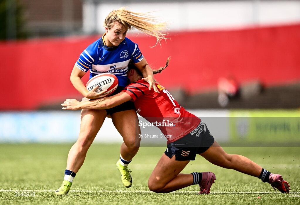 8 August 2026; Aoife Dalton of Leinster is tackled by Katie Corrigan of Munster during the Vodafone Womens Interprovincial Championship Round 1 match between Munster and Leinster at Virgin Media Park in Cork. Photo by Shauna Clinton/Sportsfile