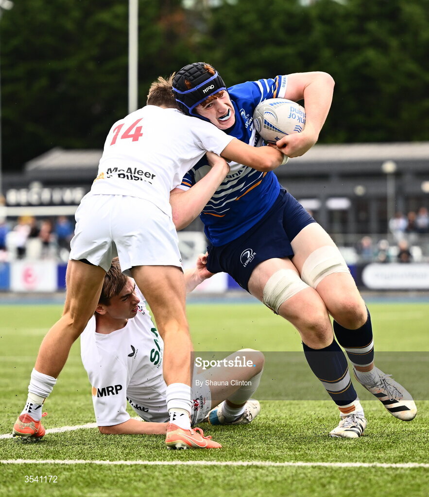16 August 2026; Ciaran Dunne of Leinster on his way to scoring his side's first try despite the efforts of JJ McVeigh of Ulster during the U18 Clubs PwC Interprovincial Championship match between Leinster and Ulster at Energia Park in Dublin. Photo by Shauna Clinton/Sportsfile