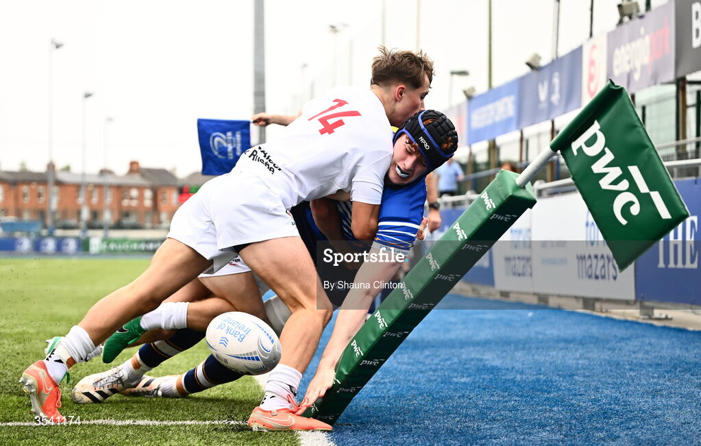 16 August 2026; Ciaran Dunne of Leinster scores his side's first try despite the efforts of JJ McVeigh of Ulster during the U18 Clubs PwC Interprovincial Championship match between Leinster and Ulster at Energia Park in Dublin. Photo by Shauna Clinton/Sportsfile