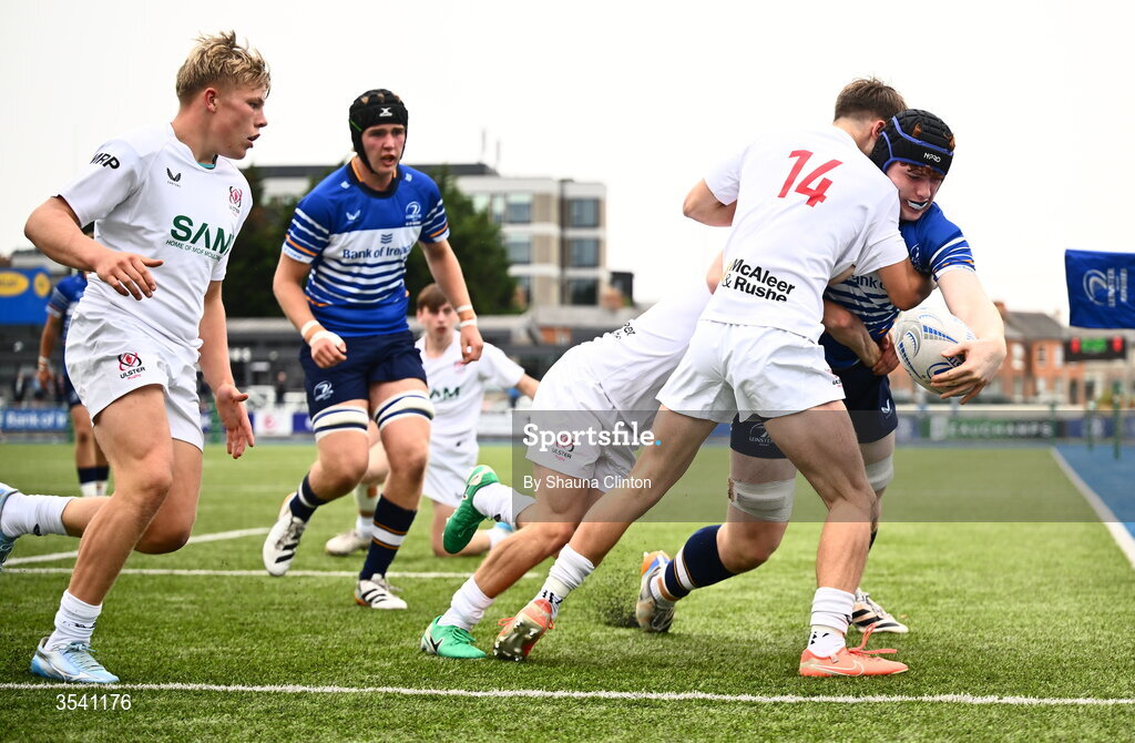 16 August 2026; Ciaran Dunne of Leinster scores his side's first try despite the efforts of JJ McVeigh of Ulster during the U18 Clubs PwC Interprovincial Championship match between Leinster and Ulster at Energia Park in Dublin. Photo by Shauna Clinton/Sportsfile