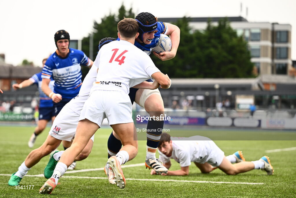 16 August 2026; Ciaran Dunne of Leinster on his way to scoring his side's first try despite the efforts of JJ McVeigh of Ulster during the U18 Clubs PwC Interprovincial Championship match between Leinster and Ulster at Energia Park in Dublin. Photo by Shauna Clinton/Sportsfile