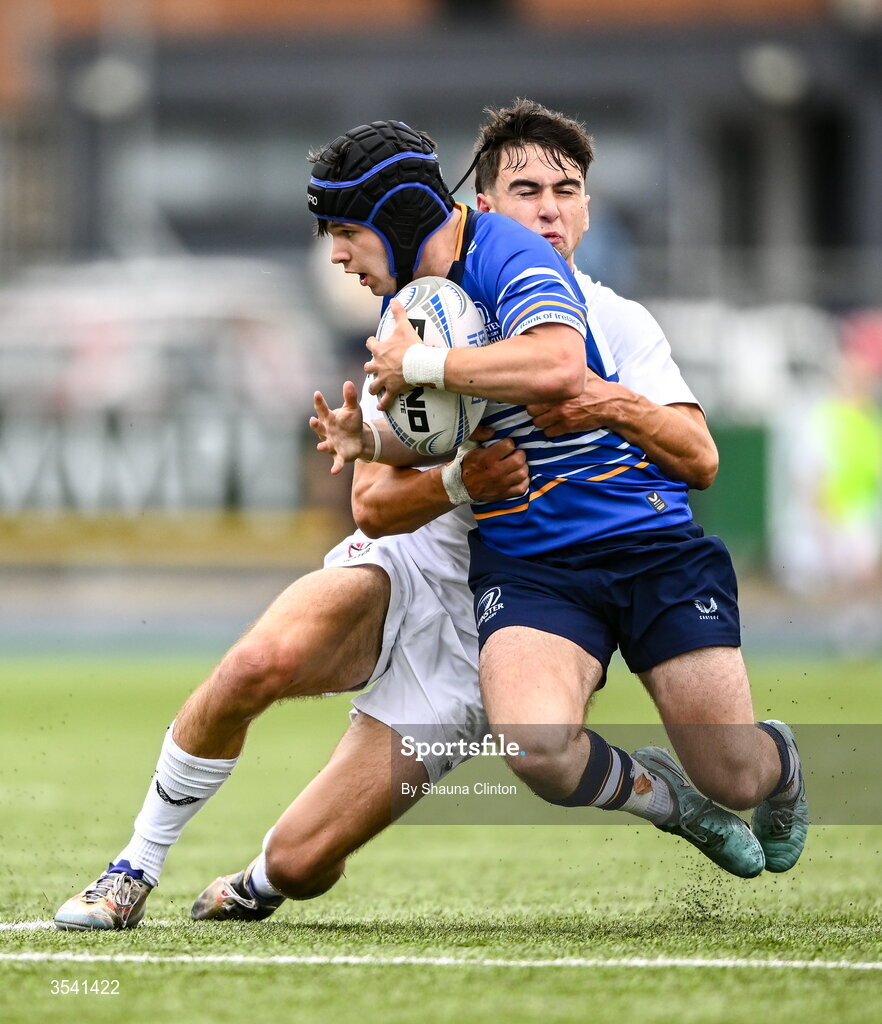 16 August 2026; Michael Redmond of Leinster is tackled by Ayrton Pienaar of Ulster during the U18 Clubs PwC Interprovincial Championship match between Leinster and Ulster at Energia Park in Dublin. Photo by Shauna Clinton/Sportsfile