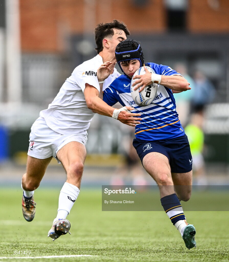 16 August 2026; Michael Redmond of Leinster is tackled by Ayrton Pienaar of Ulster during the U18 Clubs PwC Interprovincial Championship match between Leinster and Ulster at Energia Park in Dublin. Photo by Shauna Clinton/Sportsfile
