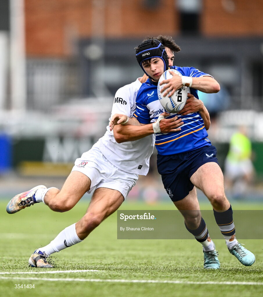 16 August 2026; Michael Redmond of Leinster is tackled by Ayrton Pienaar of Ulster during the U18 Clubs PwC Interprovincial Championship match between Leinster and Ulster at Energia Park in Dublin. Photo by Shauna Clinton/Sportsfile