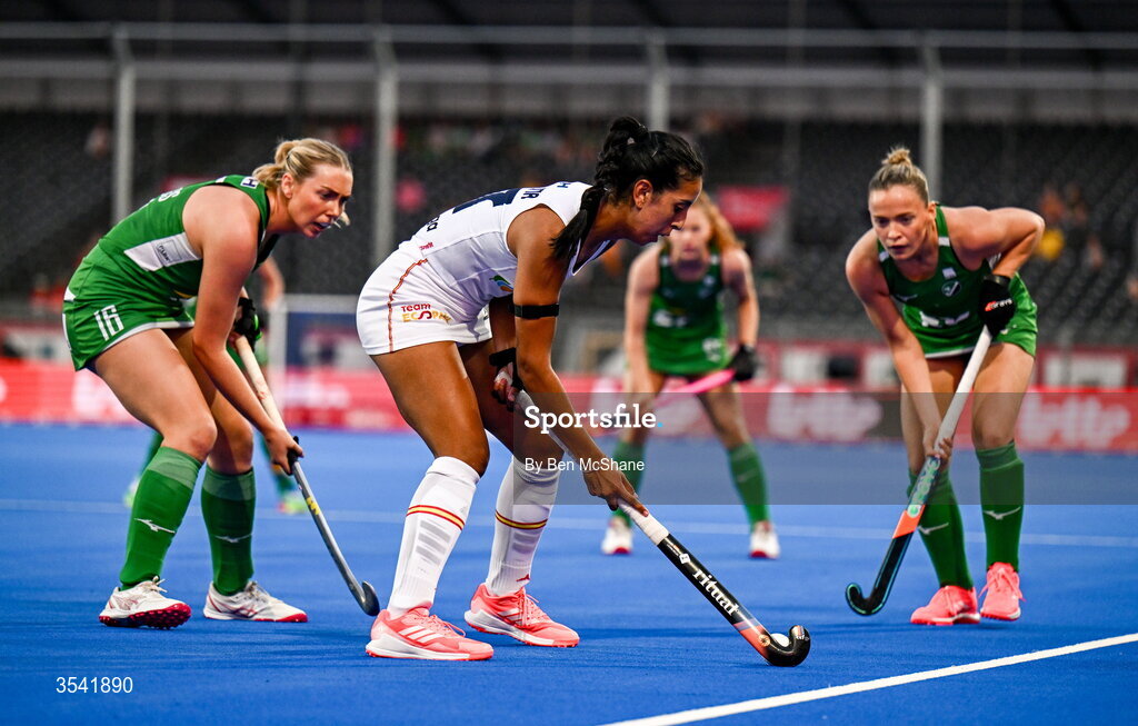 16 August 2026; Luciana Molina of Spain in action against Charlotte Beggs, left, and Mia Jennings of Ireland during the FIH Women's Hockey World Cup 2026 Pool C match between Ireland and Spain at the Belfius Hockey Arena in Wavre, Belgium. Photo by Ben McShane/Sportsfile