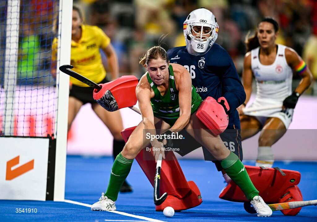 16 August 2026; Kathryn Mullan of Ireland in action against Spain goalkeeper Clara Perez during the FIH Women's Hockey World Cup 2026 Pool C match between Ireland and Spain at the Belfius Hockey Arena in Wavre, Belgium. Photo by Ben McShane/Sportsfile