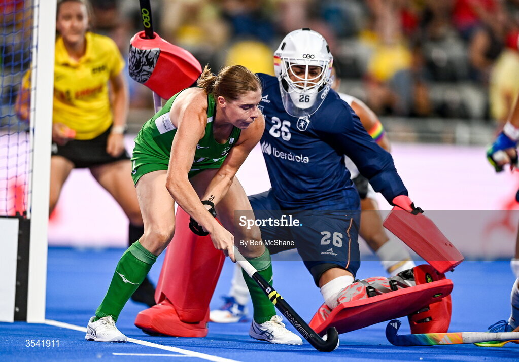 16 August 2026; Kathryn Mullan of Ireland in action against Spain goalkeeper Clara Perez during the FIH Women's Hockey World Cup 2026 Pool C match between Ireland and Spain at the Belfius Hockey Arena in Wavre, Belgium. Photo by Ben McShane/Sportsfile