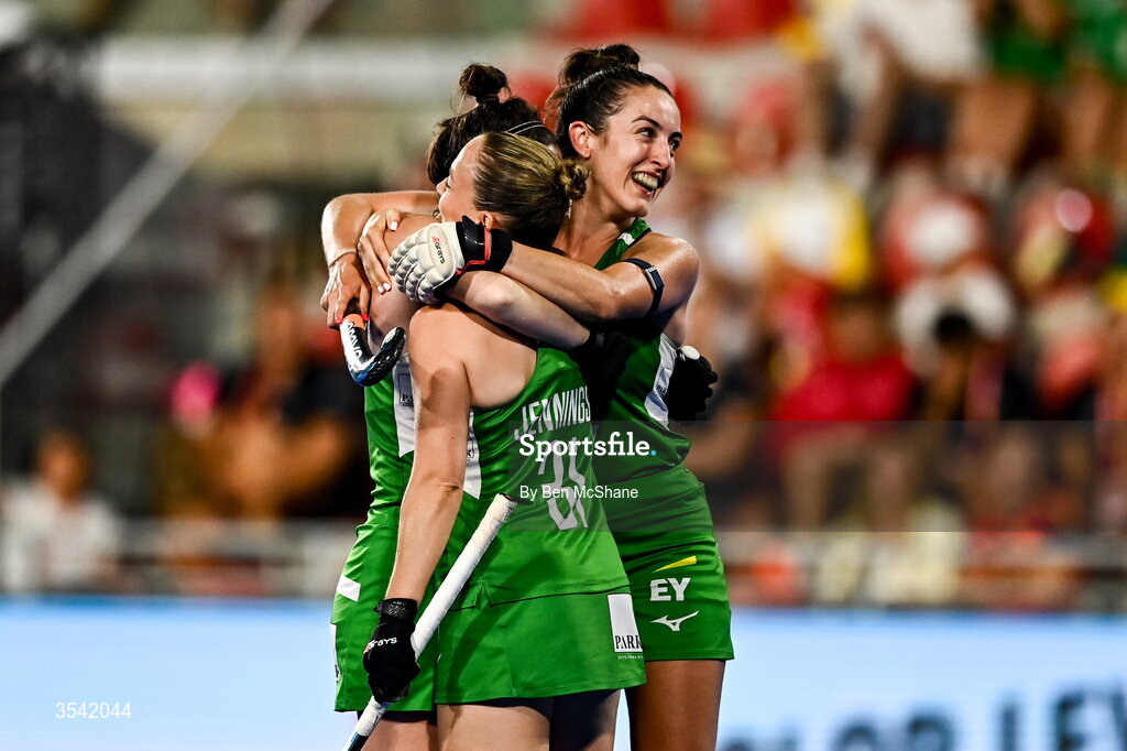 16 August 2026; Roisin Upton, left, Mia Jennings, 31, and Hannah McLoughlin of Ireland celebrate their second goal, scored by Niamh Carey, not pictured, during the FIH Women's Hockey World Cup 2026 Pool C match between Ireland and Spain at the Belfius Hockey Arena in Wavre, Belgium. Photo by Ben McShane/Sportsfile