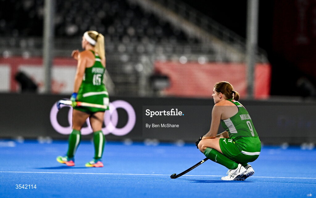 16 August 2026; Kathryn Mullan, right, and Caoimhe Perdue of Ireland react after their defeat in the FIH Women's Hockey World Cup 2026 Pool C match between Ireland and Spain at the Belfius Hockey Arena in Wavre, Belgium. Photo by Ben McShane/Sportsfile
