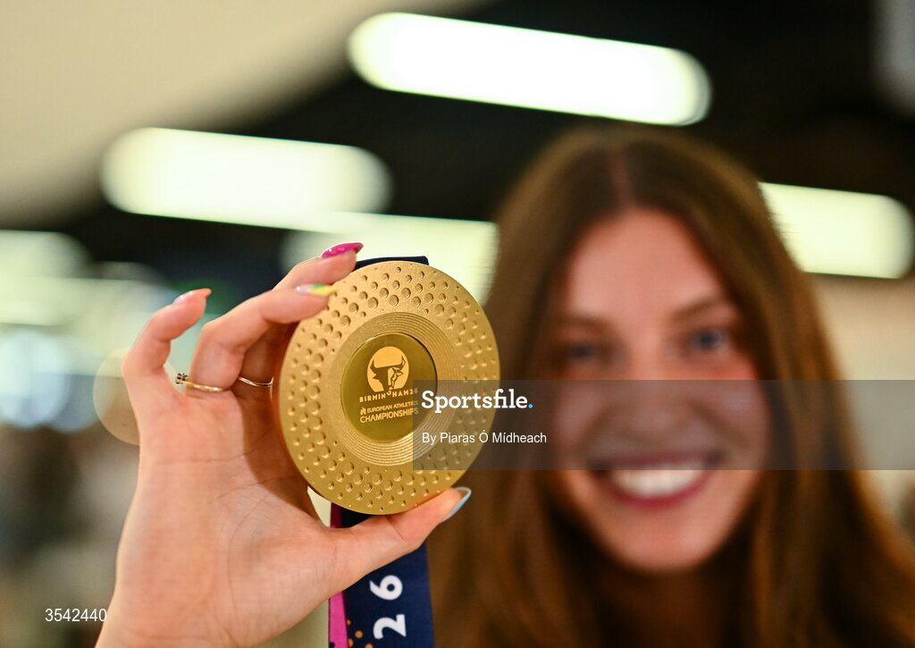 17 August 2026; Women’s heptathlon gold medalist Kate O'Connor at Dublin Airport on return from the 2026 European Athletics Championships in Birmingham, England. Photo by Piaras Ó Mídheach/Sportsfile