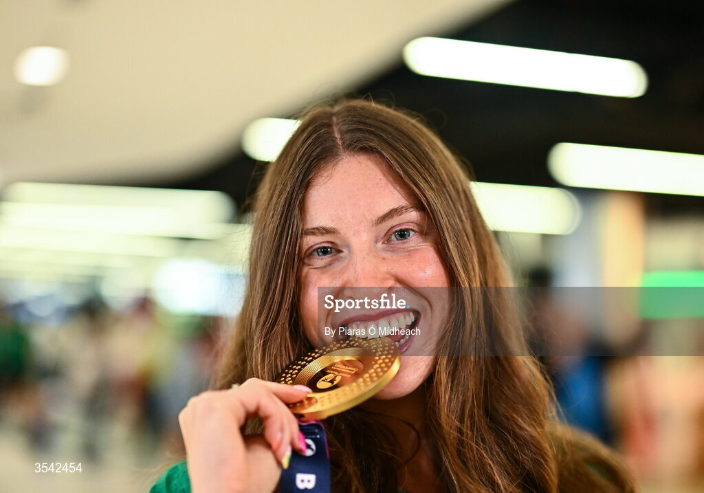 17 August 2026; Women’s heptathlon gold medalist Kate O'Connor at Dublin Airport on return from the 2026 European Athletics Championships in Birmingham, England. Photo by Piaras Ó Mídheach/Sportsfile