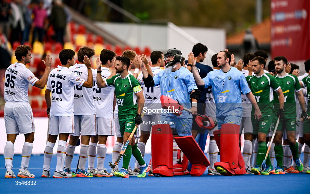 20 August 2026; Ireland players, including captain Kyle Marshall, left, greet the Spain players before the FIH Men's Hockey World Cup 2026 Pool C match between Ireland and Spain at the Belfius Hockey Arena in Wavre, Belgium. Photo by Ben McShane/Sportsfile