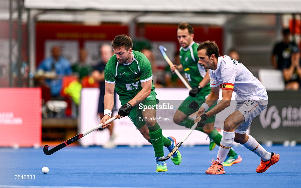 20 August 2026; Jeremy Duncan of Ireland in action against Marc Miralles of Spain during the FIH Men's Hockey World Cup 2026 Pool C match between Ireland and Spain at the Belfius Hockey Arena in Wavre, Belgium. Photo by Ben McShane/Sportsfile