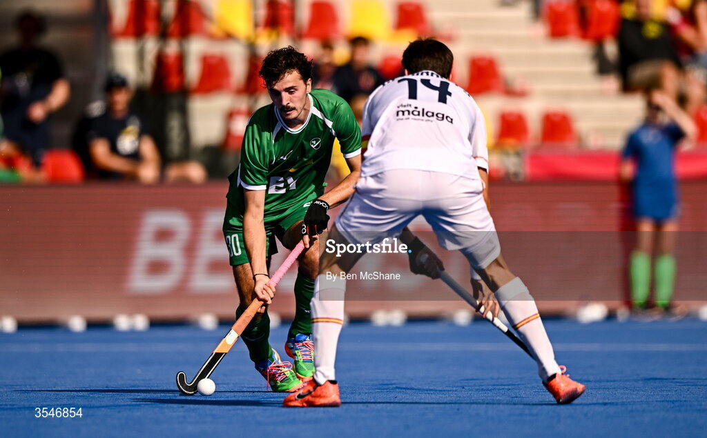 20 August 2026; Louis Rowe of Ireland in action against Marc Miralles of Spain during the FIH Men's Hockey World Cup 2026 Pool C match between Ireland and Spain at the Belfius Hockey Arena in Wavre, Belgium. Photo by Ben McShane/Sportsfile
