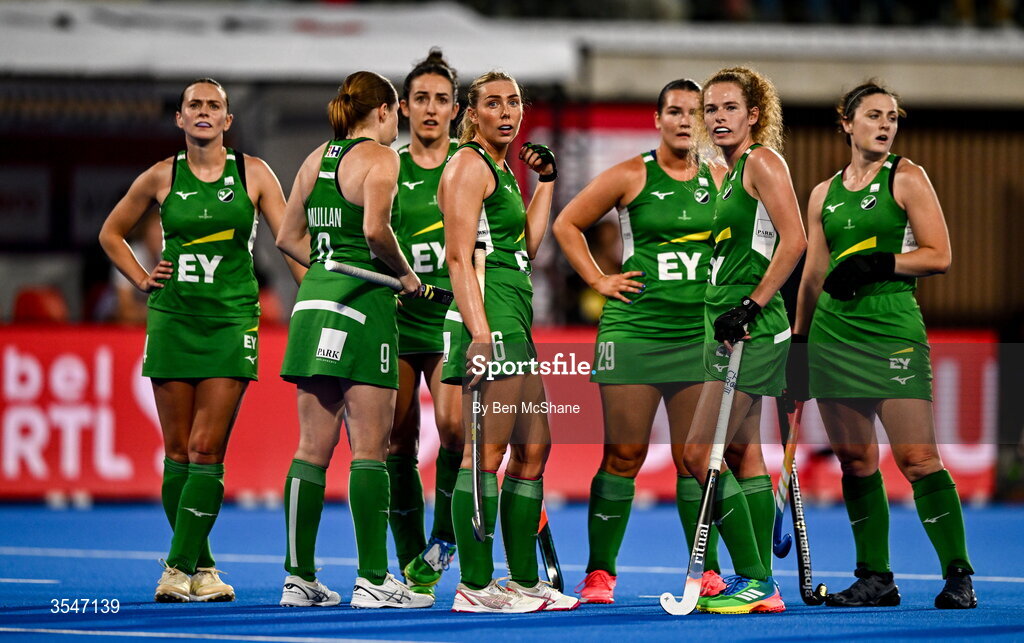 20 August 2026; Ireland players, from left, Ellen Curran, Kathryn Mullan, Hannah McLoughlin, Charlotte Beggs, Mikayla Power, Niamh Carey and Roisin Upton look to the big screen during a Video Referral during the FIH Women's Hockey World Cup 2026 Pool C match between Belgium and Ireland at the Belfius Hockey Arena in Wavre, Belgium. Photo by Ben McShane/Sportsfile