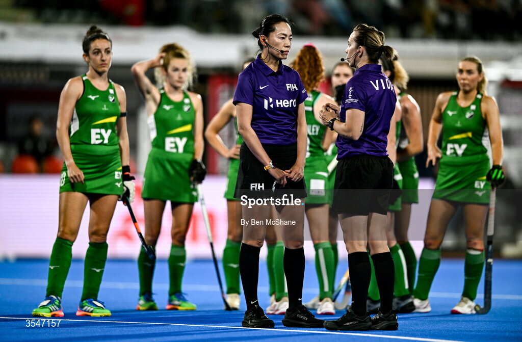 20 August 2026; Umpires Liu Xiaoying, left, and Rachel Williams in conversation following a video referral during the FIH Women's Hockey World Cup 2026 Pool C match between Belgium and Ireland at the Belfius Hockey Arena in Wavre, Belgium. Photo by Ben McShane/Sportsfile