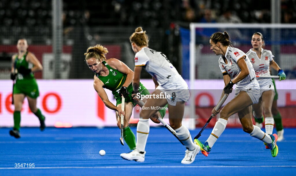 20 August 2026; Michelle Carey of Ireland in action against Emma Puvrez, centre, and Judith Vandermeiren of Belgium during the FIH Women's Hockey World Cup 2026 Pool C match between Belgium and Ireland at the Belfius Hockey Arena in Wavre, Belgium. Photo by Ben McShane/Sportsfile