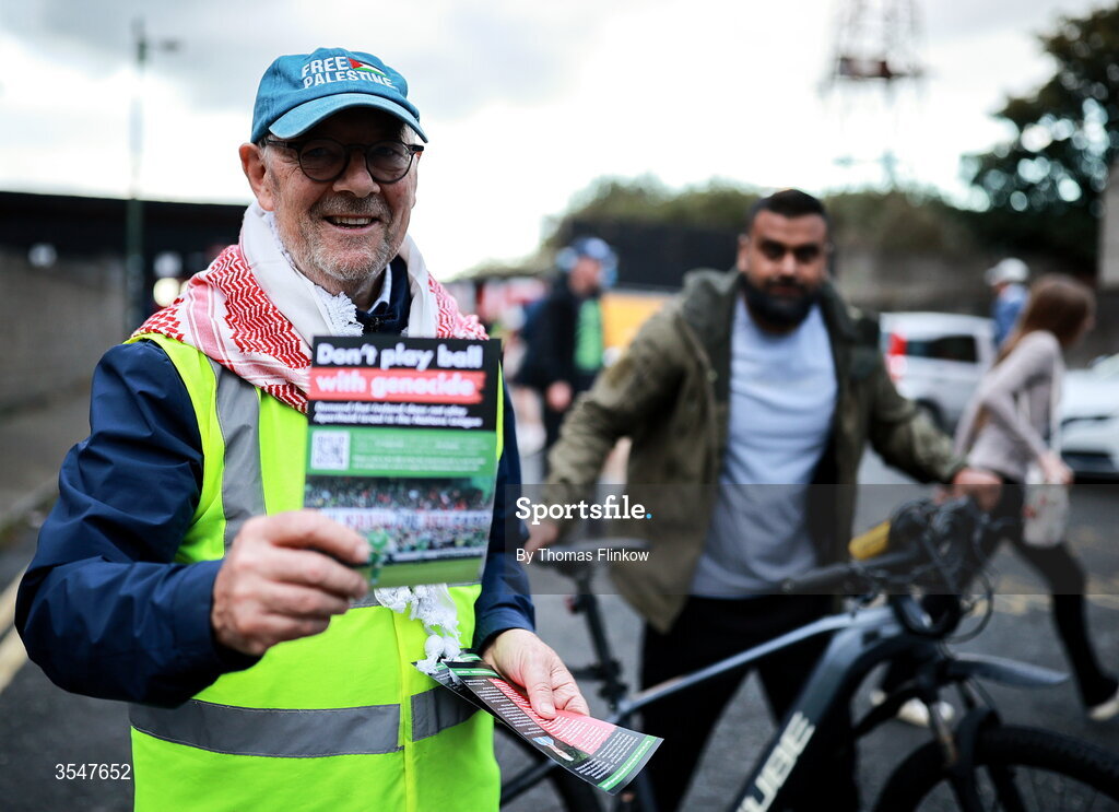 21 August 2026; A protester outside the grounds before the SSE Airtricity Men’s Premier Division match between Bohemians and Derry City at Dalymount Park in Dublin. Photo by Thomas Flinkow/Sportsfile