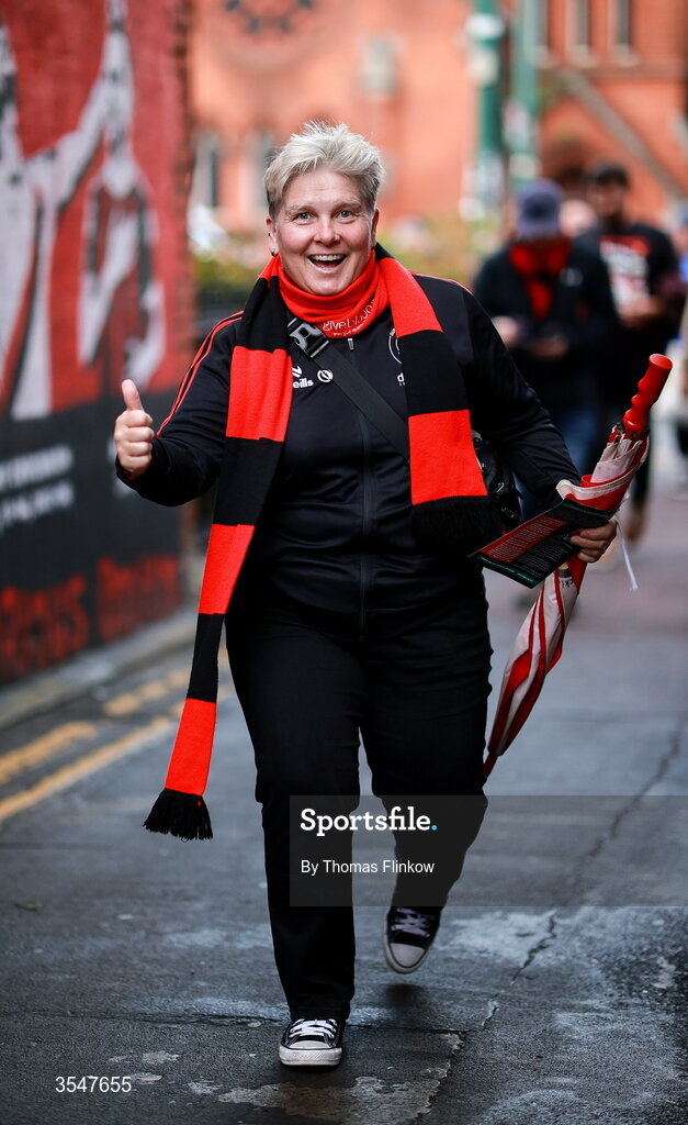21 August 2026; A Bohemians supporter makes her way to the grounds before the SSE Airtricity Men’s Premier Division match between Bohemians and Derry City at Dalymount Park in Dublin. Photo by Thomas Flinkow/Sportsfile