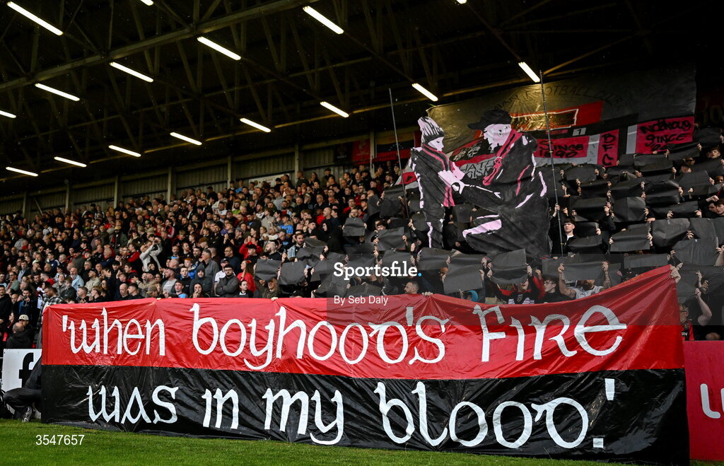 21 August 2026; Bohemians supporters hold up banners before the SSE Airtricity Men’s Premier Division match between Bohemians and Derry City at Dalymount Park in Dublin. Photo by Seb Daly/Sportsfile