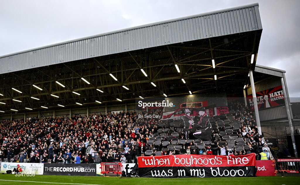 21 August 2026; Bohemians supporters hold up banners before the SSE Airtricity Men’s Premier Division match between Bohemians and Derry City at Dalymount Park in Dublin. Photo by Seb Daly/Sportsfile