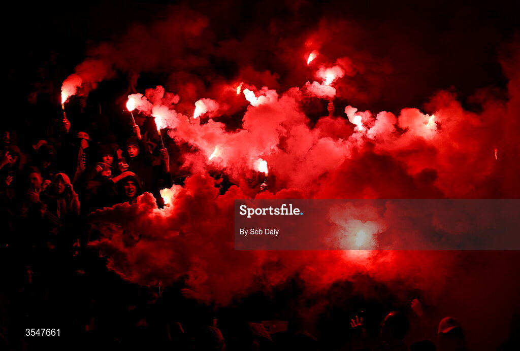 21 August 2026; Bohemians supporters hold up flares before the SSE Airtricity Men’s Premier Division match between Bohemians and Derry City at Dalymount Park in Dublin. Photo by Seb Daly/Sportsfile