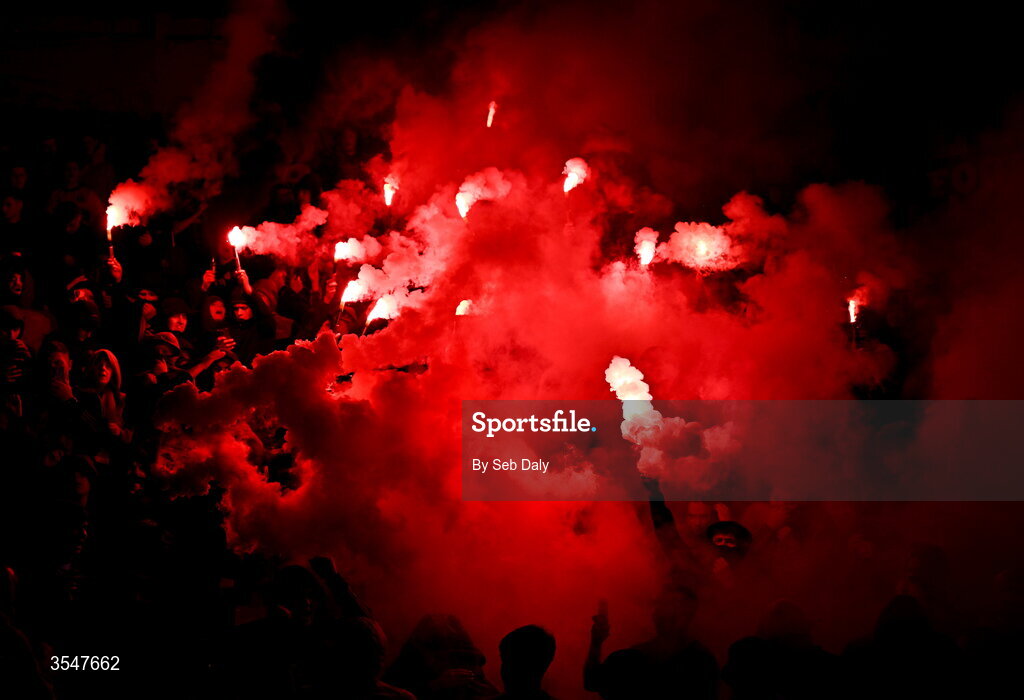 21 August 2026; Bohemians supporters hold up flares before the SSE Airtricity Men’s Premier Division match between Bohemians and Derry City at Dalymount Park in Dublin. Photo by Seb Daly/Sportsfile