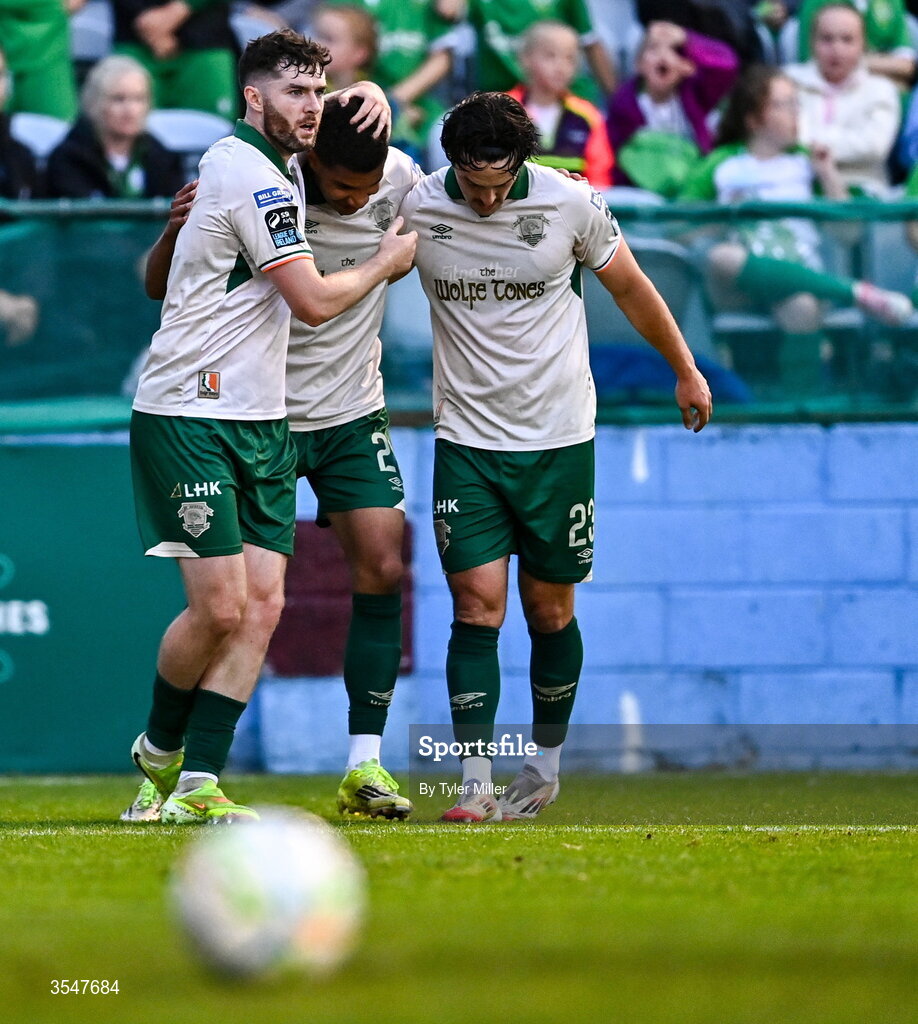 21 August 2026; Anthony Olusanya of St Patrick's Athletic, centre, celebrates with team-mates Aidan Keena, left, and James Brown after scoring their side's first goal during the SSE Airtricity Men’s Premier Division match between Drogheda United and St Patrick's Athletic at Sullivan & Lambe Park in Drogheda, Louth. Photo by Tyler Miller/Sportsfile