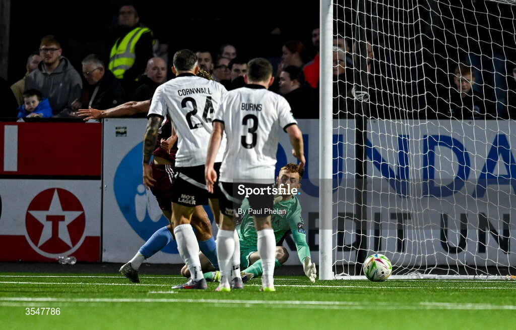 21 August 2026; Dundalk goalkeeper Enda Minogue cannot prevent Kris Twardek of Galway United from scoring his sides second goal during the SSE Airtricity Men’s Premier Division match between Dundalk and Galway United at Oriel Park in Dundalk, Louth. Photo by Paul Phelan/Sportsfile